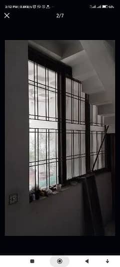 Iron Grill with sliding doors with glass