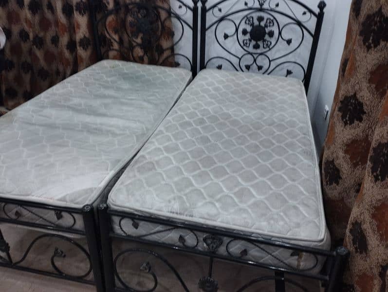 2 Single Iron rod Beds with MoltyFoam Master Spring Mattress 1