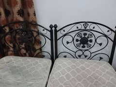 2 Single Iron rod Beds with MoltyFoam Master Spring Mattress