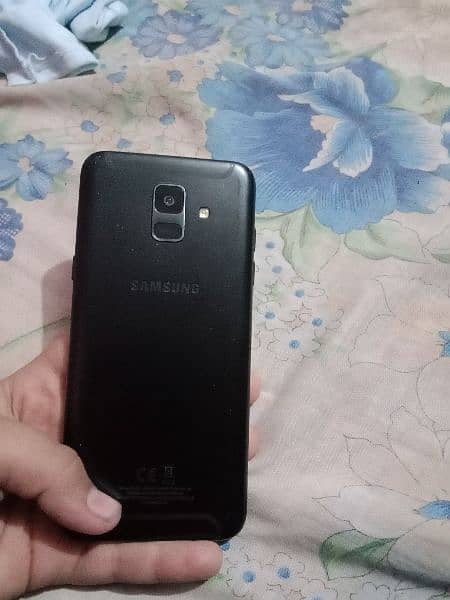 am selling my Samsung Galaxy a6 with cover 1