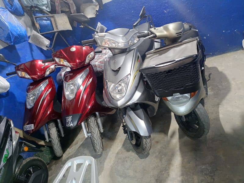 scooties 49cc,electric,100cc contact at 03004142432 5