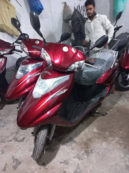 scooties 49cc,electric,100cc contact at 03004142432 10