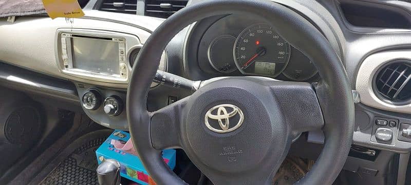 Pearl White Toyota Vitz 12