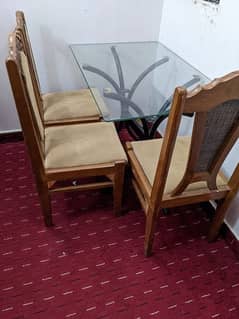 dining table with 3 wood chairs