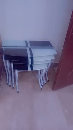 a set of 3 tables in good condition