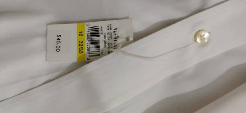 Brand new imported shirts in white and off white colour for sale. 4