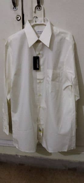 Brand new imported shirts in white and off white colour for sale. 5
