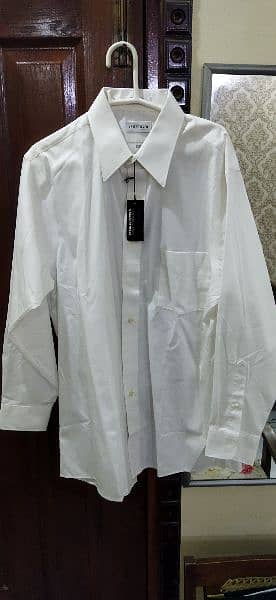 Brand new imported shirts in white and off white colour for sale. 8