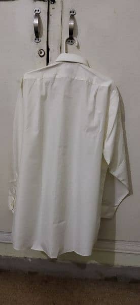 Brand new imported shirts in white and off white colour for sale. 9