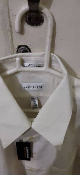 Brand new imported shirts in white and off white colour for sale. 11