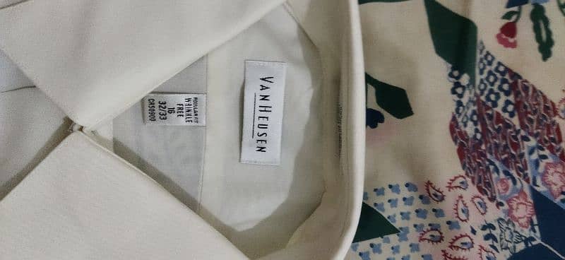 Brand new imported shirts in white and off white colour for sale. 13