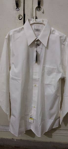 Brand new imported shirts in white and off white colour for sale. 16