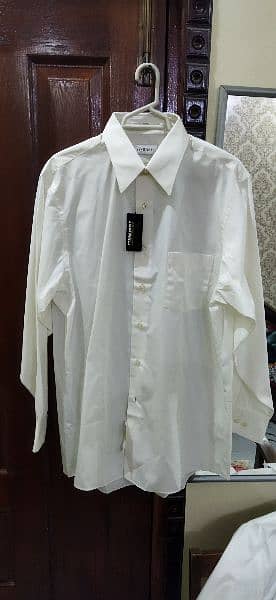 Brand new imported shirts in white and off white colour for sale. 18
