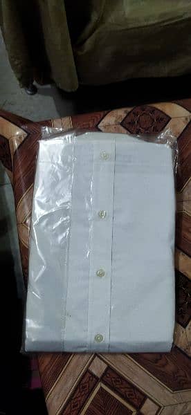 Brand New  2  Shirts in white colour for sale. 1