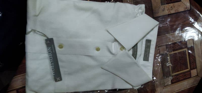 Brand New  2  Shirts in white colour for sale. 12