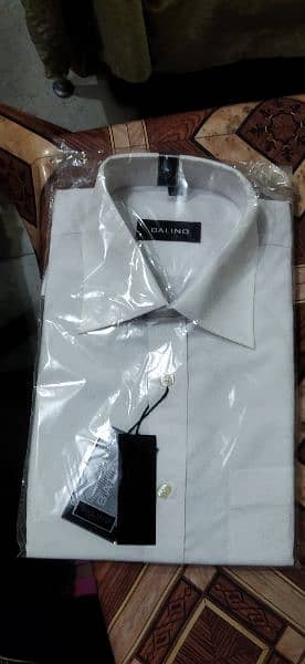 Brand New  2  Shirts in white colour for sale. 14