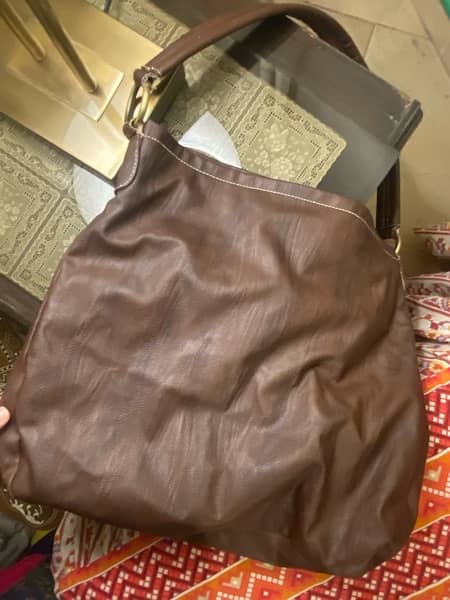leather bag preloved perfect condition 1000 rupees only 1