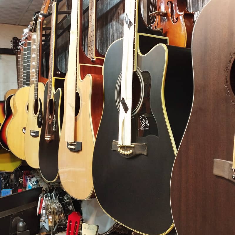Jambo acoustic guitar at Acoustica guitar shop 1