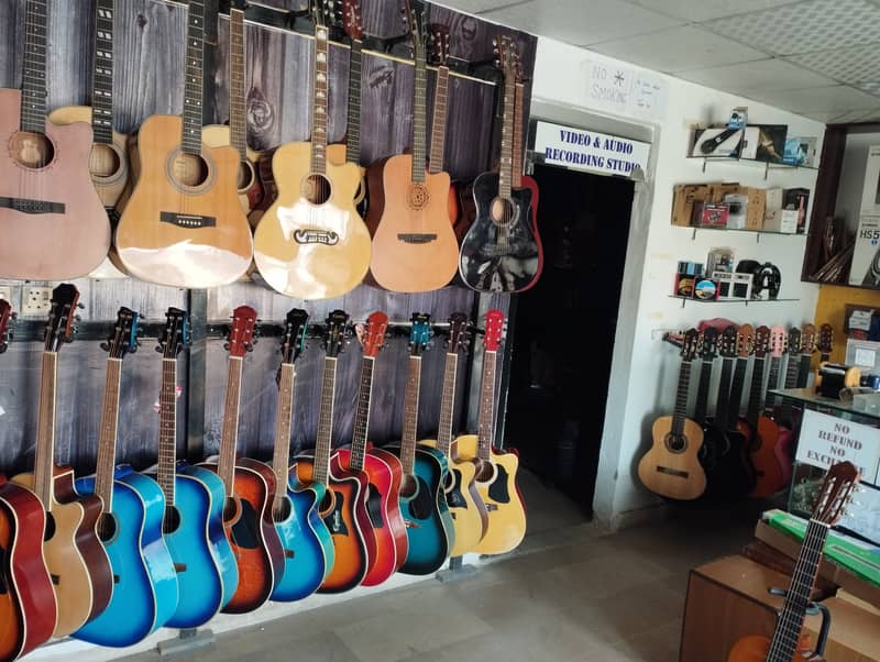 Jambo acoustic guitar at Acoustica guitar shop 2