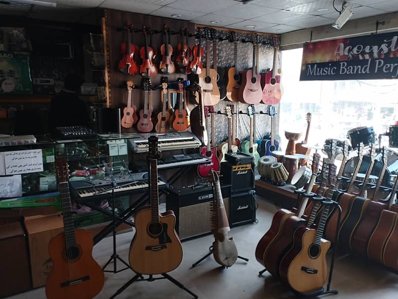 Jambo acoustic guitar at Acoustica guitar shop 3