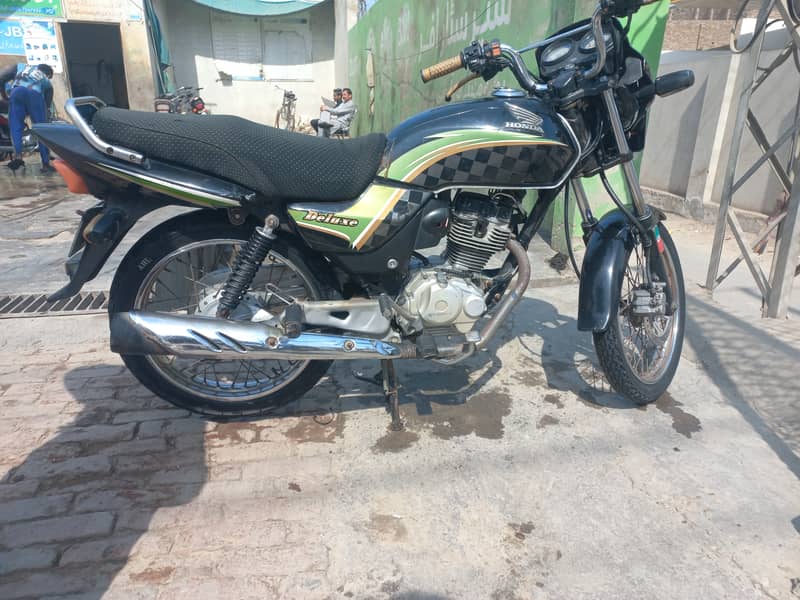 Honda deluxe 2013 model only serious buyer contact no work engine 100% 3