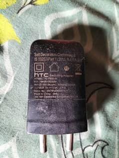 old is gold. . . . ! BRANDED HTC mobile charger 5v 1.5A good working