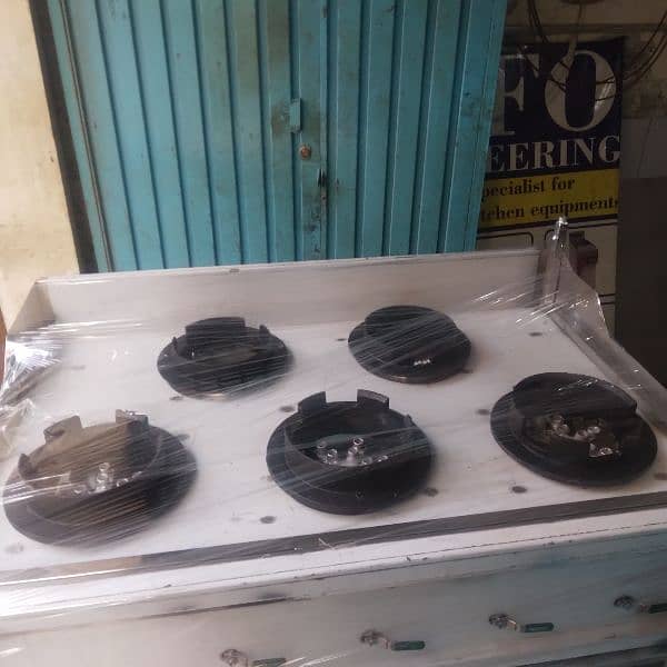 Chinese stove 3 burners  size 30x48 with water system 14