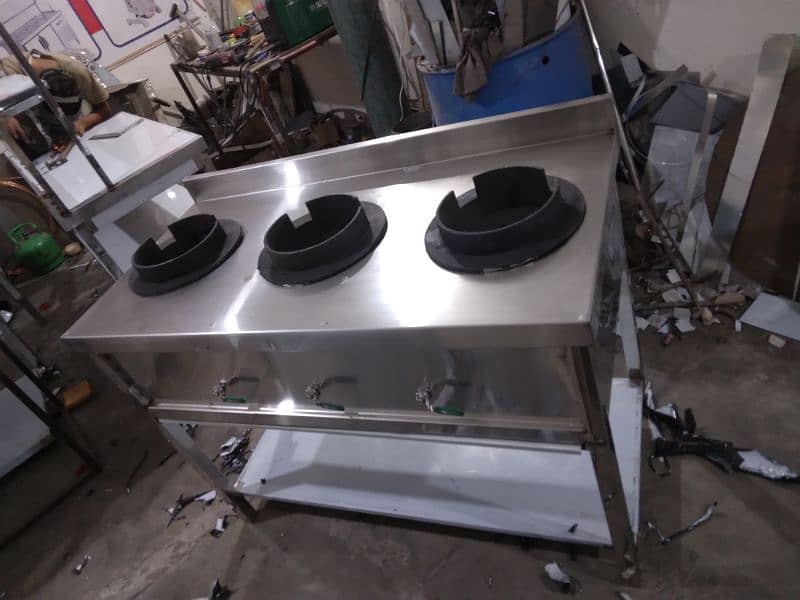 Chinese stove 3 burners  size 30x48 with water system 10