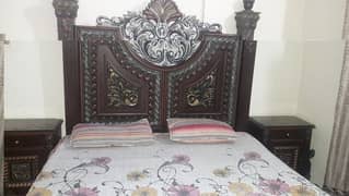 king size wooden bed with 2 side table and dressing