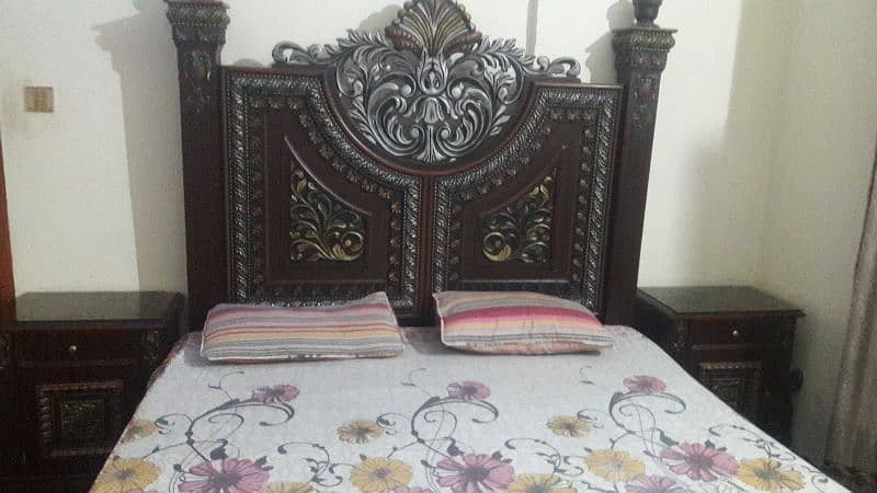 king size wooden bed with 2 side table and dressing 1