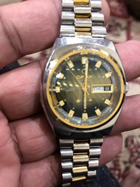 vintage OMAX Automatic 25 jewels watch . 0