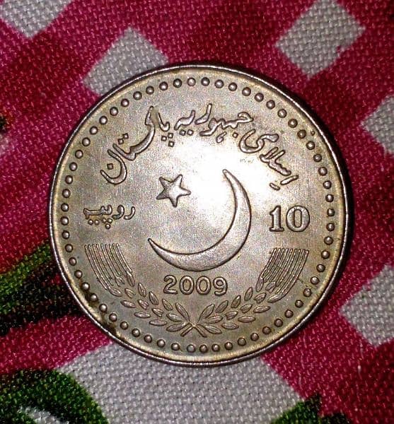 old coin 1949 sy 2009 ka Pakistan or china ka coin 60 Saal 0