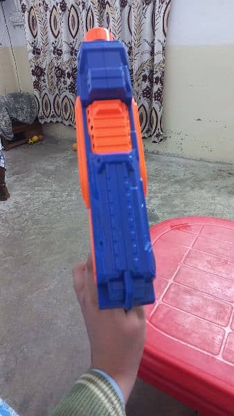 A toy gun with 6 soft rubber bullets 2