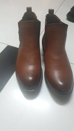 brown buckle boots 0