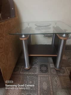 Two side tables with glass top for sale