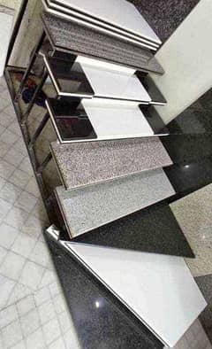 BLACK GRANITE FOR STAIRS AND TRAVERTINE FOR FRONT ELEVATION AVAILABLE