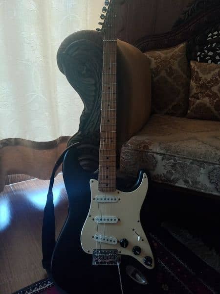 stratocaster style electric guitar 0