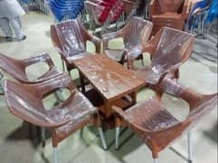 Set of 4 plastic chairs with 1 table available at wholesale price.