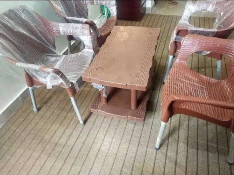 Set of 4 plastic chairs with 1 table available at wholesale price. 2