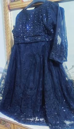 Beautiful black net dress having shirt & tightable lehnga