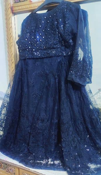 Beautiful black net dress having shirt & tightable lehnga 0
