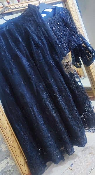 Beautiful black net dress having shirt & tightable lehnga 4