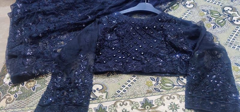 Beautiful black net dress having shirt & tightable lehnga 6