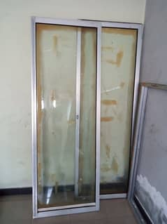 Aluminuim Door with 8 mm Glass.  8 by 5 feet