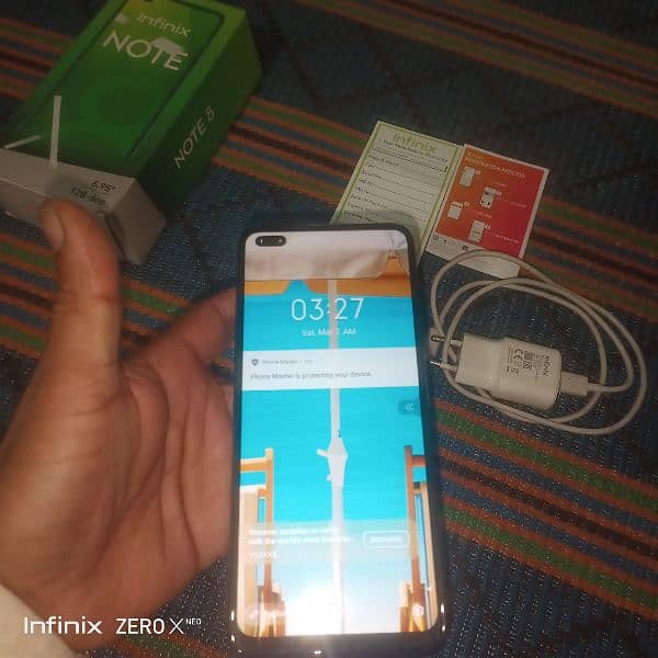 Infinix note 8 complete box with charger 3