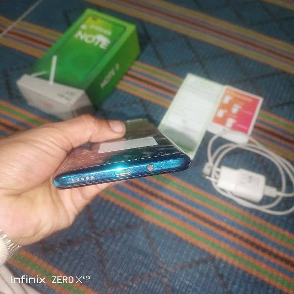 Infinix note 8 complete box with charger 7