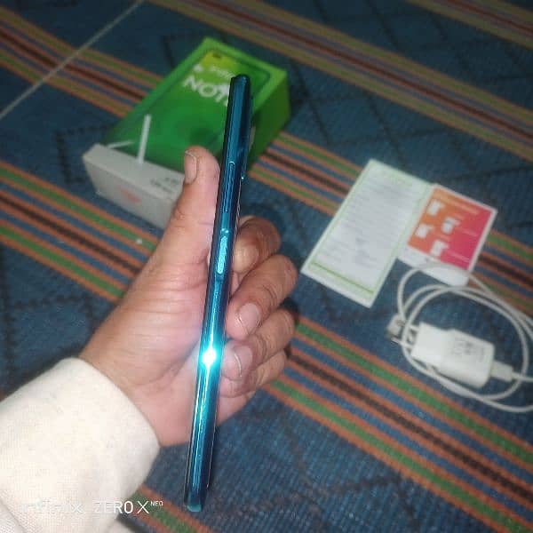 Infinix note 8 complete box with charger 9