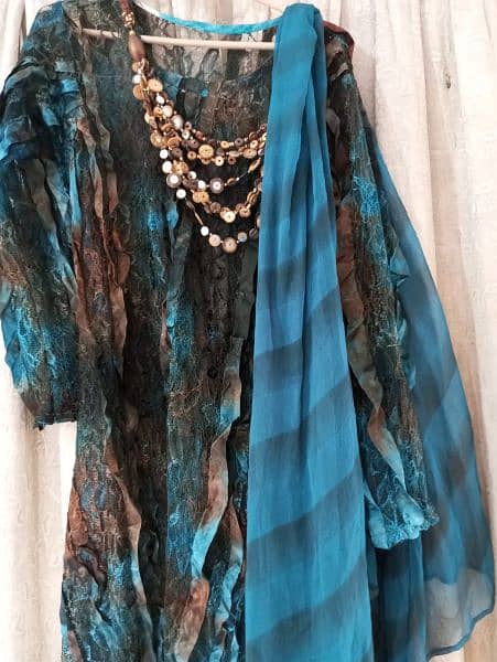 net frock with choori dar pajama with tie anddie dupatta 3