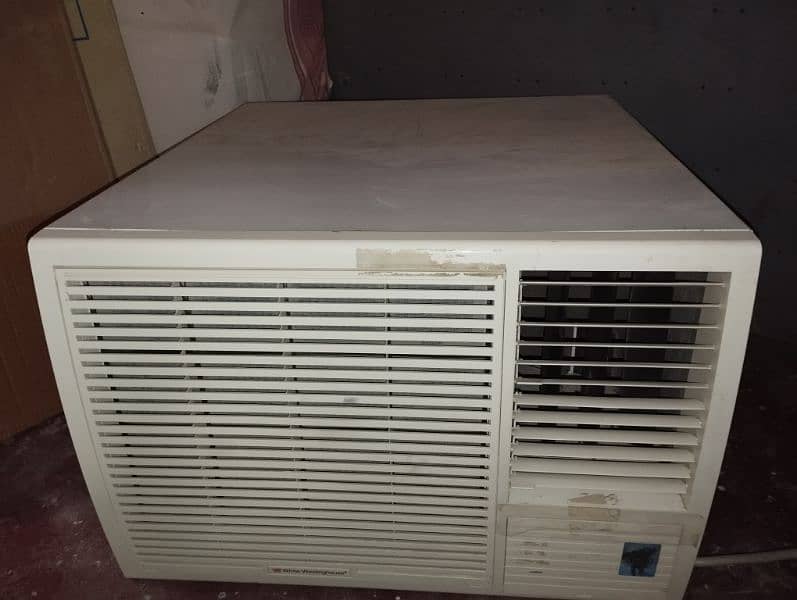white Westinghouse 2 ton window AC made in Behrain 1