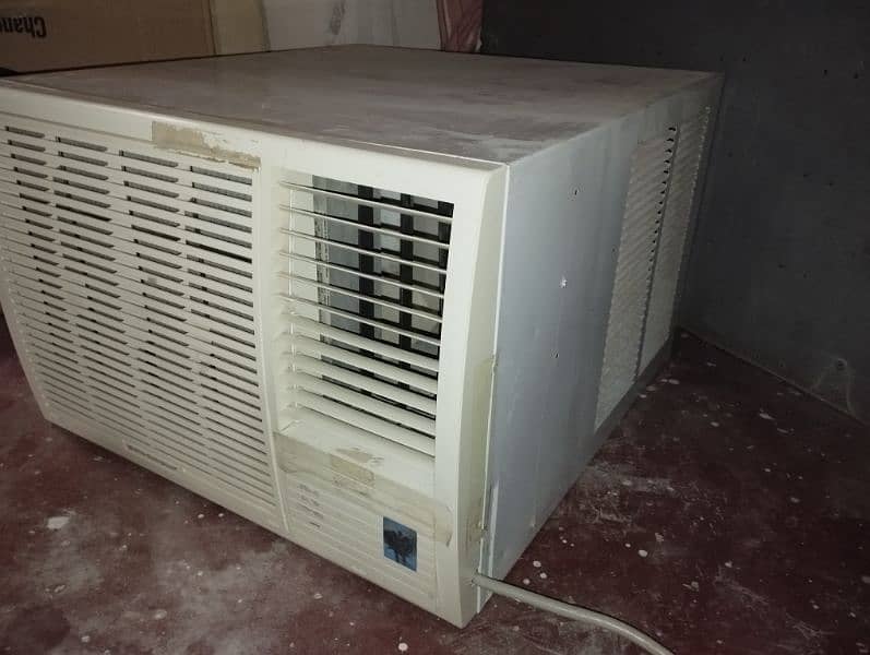 white Westinghouse 2 ton window AC made in Behrain 2